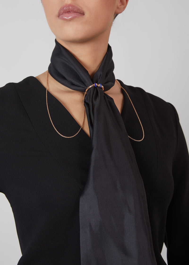 Twist scarf ring in 18 karat rose gold and lapis lazuli , worn with black silk scarf